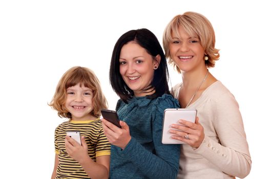 three generation little girl teenage girl and woman with tablet and smart phones