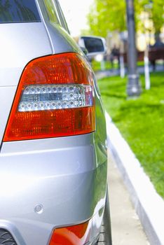 Back headlight of car by closeup .