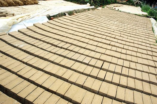 drying clay molds in the manufacturing process of bricks