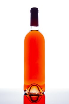 bottle of red wine with paths on white background