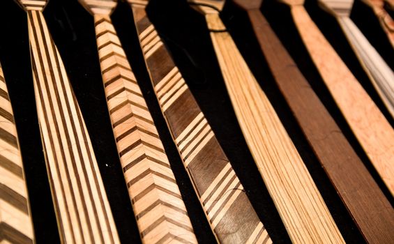 Wooden ties with different designs waiting for being sold