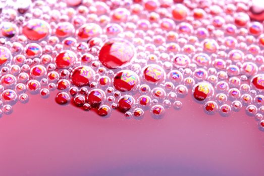 Bubbles of red wine from the different foreshortening  in glass