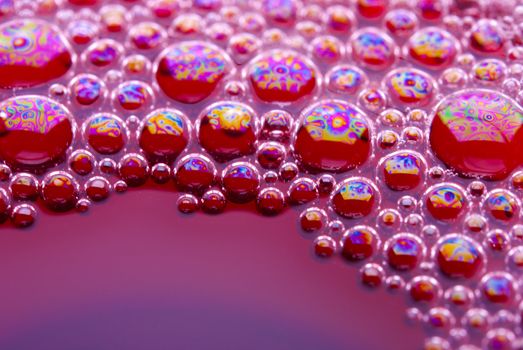 Bubbles of red wine from the different foreshortening  in glass