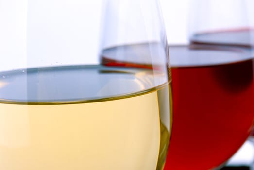 Glasses with wine on a white background