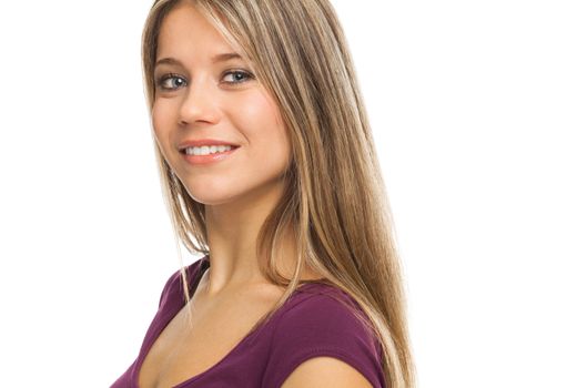 Closeup portrait of a young blond woman smiling, on white