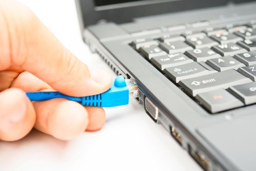 Connecting of internet cable to the notebook