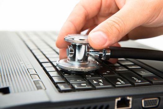 Concept of diagnostic. Stethoscope and laptop