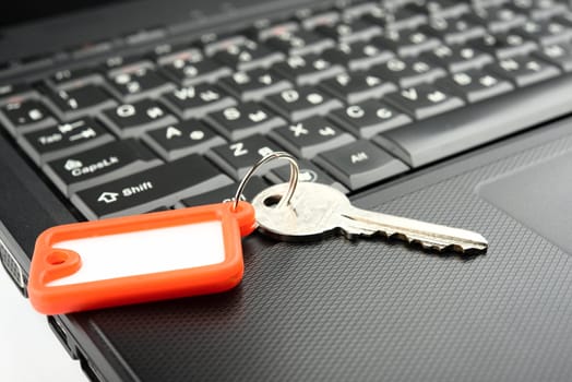 key on laptop keyboard with shallow depth of field