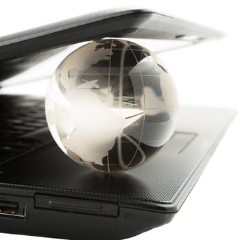 globe on a laptop keyboard