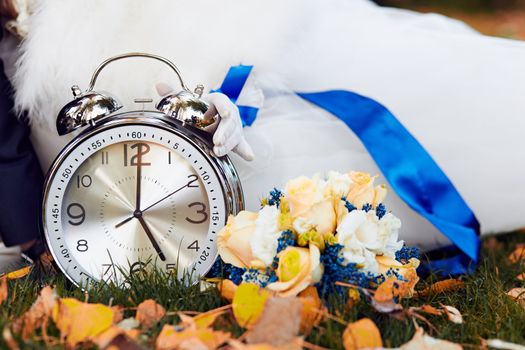 The bride and a large clock