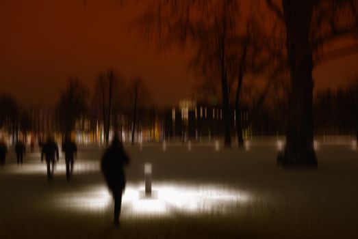 Conceptual capture - stormy night in the park after snow.