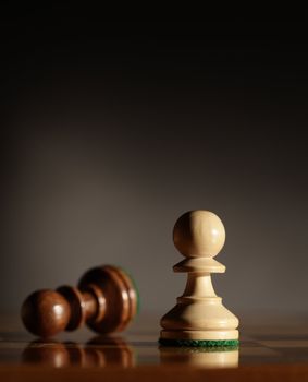 pawns chess pieces, Low depth of field, focus on foreground.