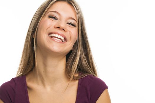 Close up portrait of a nice blond woman laughing, on white