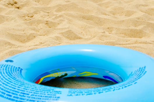 blue circle on sand