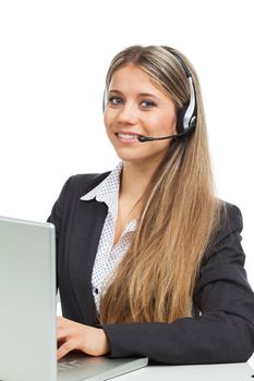 Beautiful young woman with headphones and laptop illustrating business service, on white