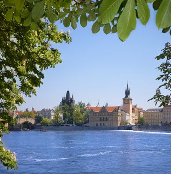 View on embankment of Old city and part of Charles bridge in Prague.
