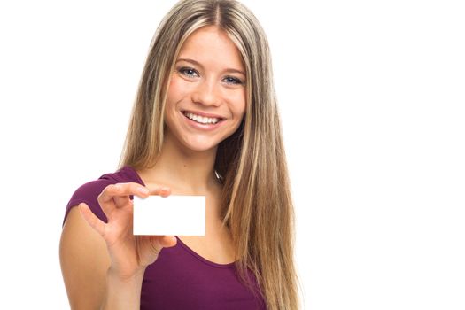 Closeup portrait of a young woman showing a white card, isolated on white