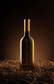 white wine bottle on a dark background