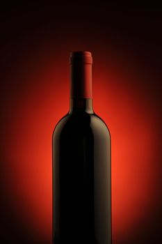red wine bottle , red light on background