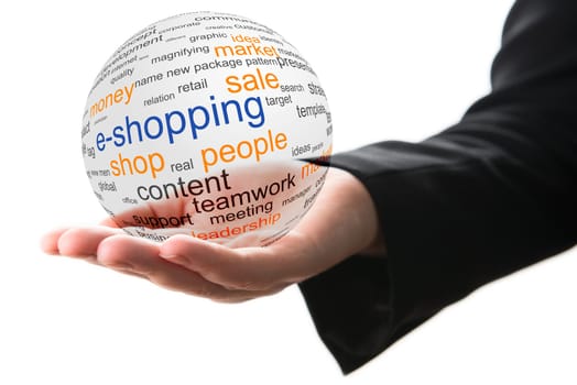 Transparent ball with word e-shopping in a hand