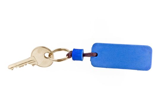 House key with blue tag isolated on white