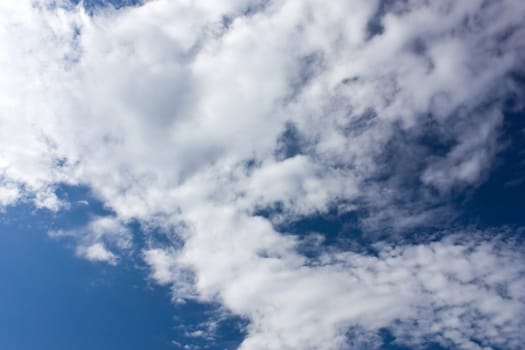 Wthite clouds on clear blue sky