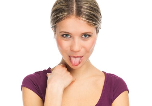 Young expressive woman with her tongue out, on white