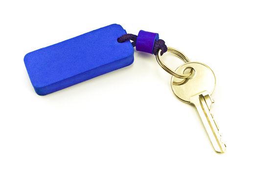 House key with blue tag isolated on white