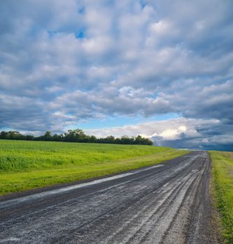 rural road and stormy clouds