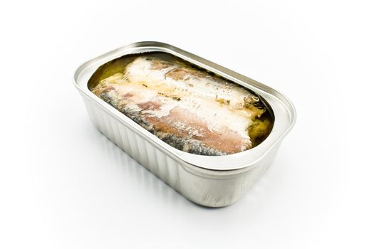 Sardines in opened tin can isolated on white