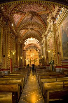 Ornate Guadalupita Church Interior Morelia Mexico Aisle leading to altar
