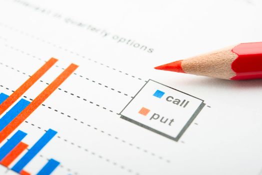 Company year report with graphs and pencil