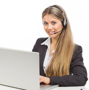 Blond young woman with headphones and laptop illustrating business service, on white