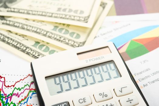 Finance charts , money and calculator .