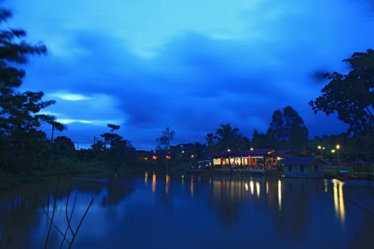 building on the lake in dusk