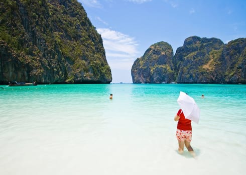 Red shirt lady at Maya bay, PhiPhi Island , Phuket Thailand