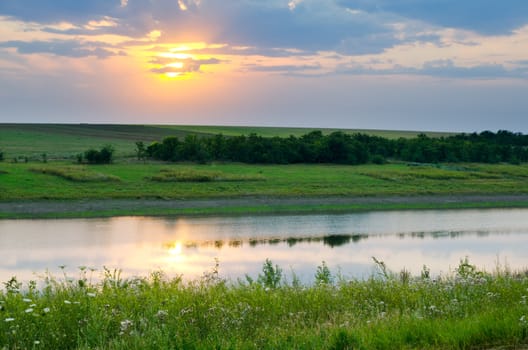 sunset over river