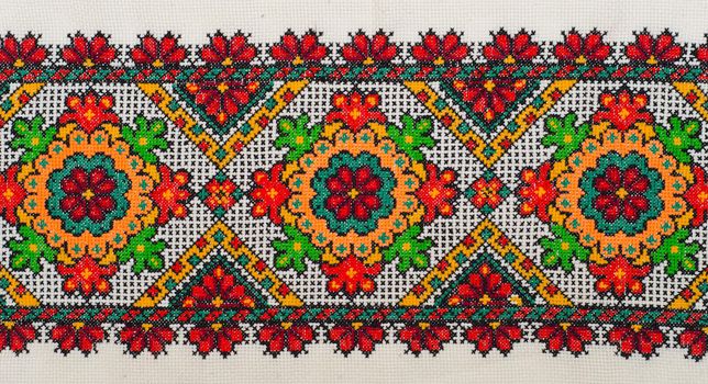 embroidered good by cross-stitch pattern. ukrainian ethnic ornament