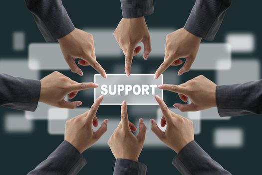 A diverse business team with hands together push Support button