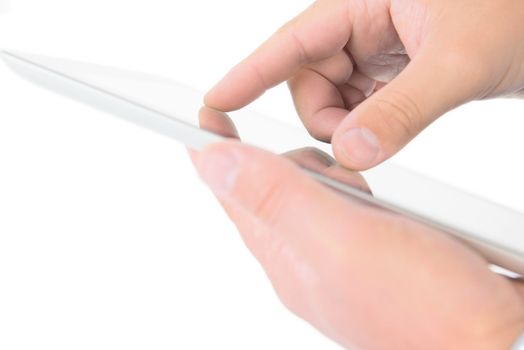 Hands holding modern digital tablet pc with blank screen