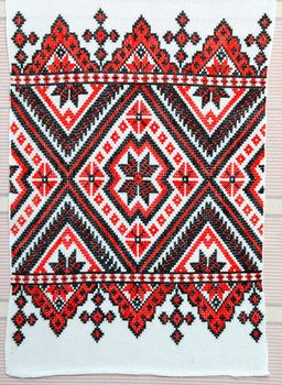 embroidered good by cross-stitch pattern. ukrainian ethnic ornament