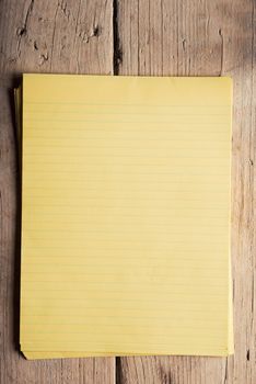 Blank notepaper on raw unpainted hardwood sidelight