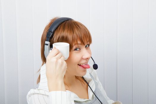 Operator on-line service. Girl in a playful mood