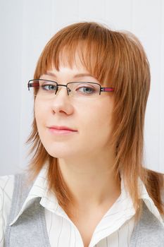 Portrait of an attractive young business woman in office