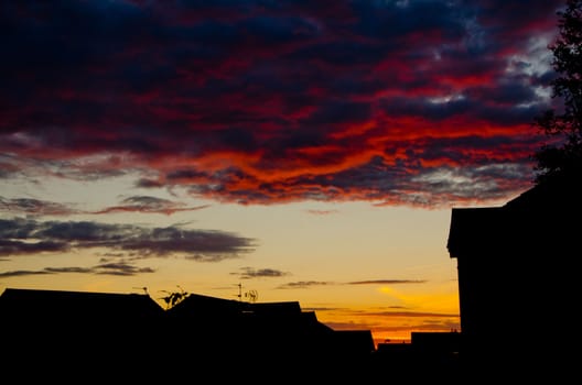 Picture of a sunset across rooftops