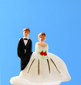 wedding couple doll with blue sky