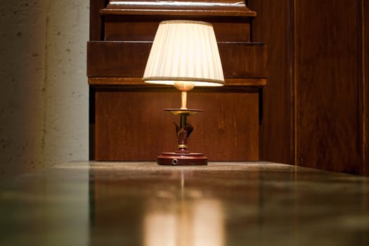 Photo of Bajour on the wooden writing desk