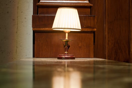 Photo of Bajour on the wooden writing desk