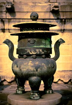 An old incense burner in Oriental style.