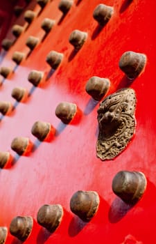 Red gate for an entry into the Imperial Palace in Beijing, China.